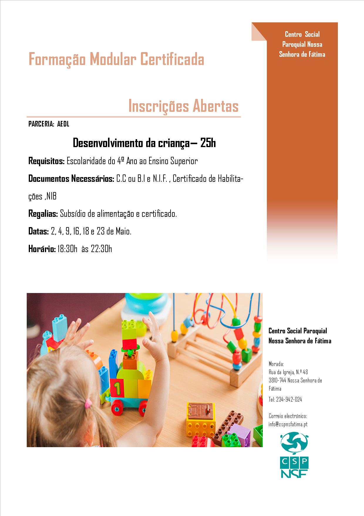 Preschool child playing with colorful building blocks