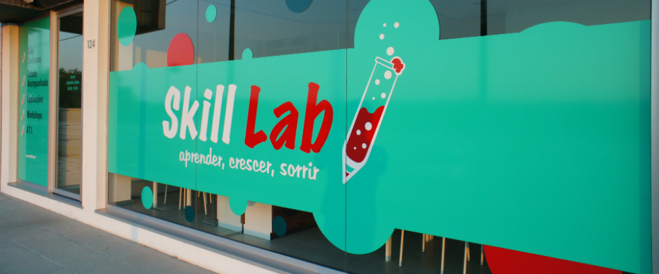 Skill Lab exterior view, showing the school's logo and name on the window.