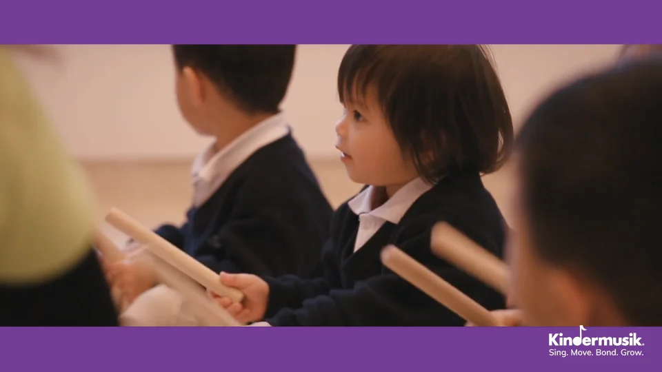 Preschool children playing musical instruments