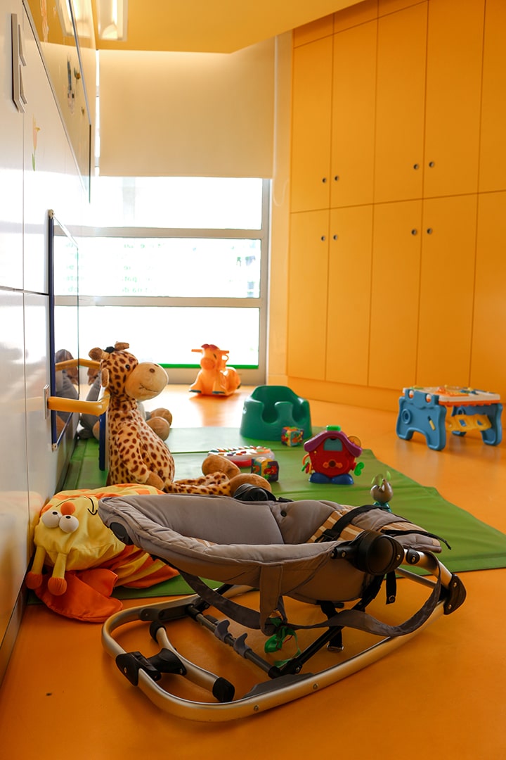Preschool classroom with toys and furniture