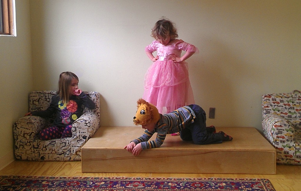 Preschool children playing dress-up and engaging in imaginative play